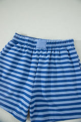 Blue and white horizontal striped shorts with an elastic waistband and drawstring, displayed flat on a white background.