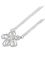 A silver-tone pendant necklace featuring a decorative flower or bow design embellished with sparkling cubic zirconia stones, suspended from a delicate chain.