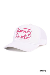 A white baseball cap with pink embroidered script text reading "Howdy Darlin'" across the front. The cap features a curved bill and classic structured design.