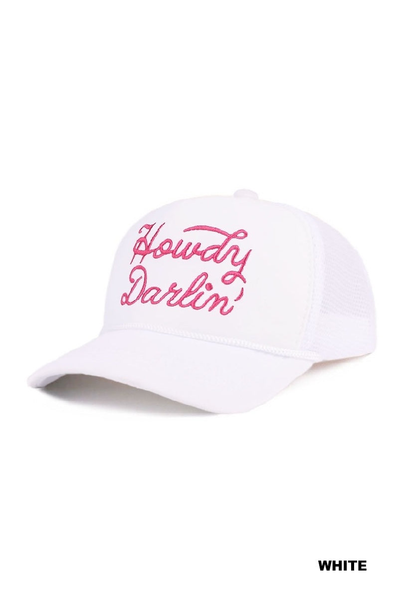A white baseball cap with pink embroidered script text reading "Howdy Darlin'" across the front. The cap features a curved bill and classic structured design.