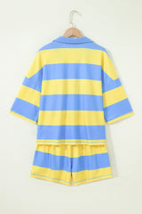 A children's two-piece set featuring a short-sleeved striped shirt and matching shorts in alternating blue and yellow horizontal stripes, displayed on a wooden hanger against a white background.